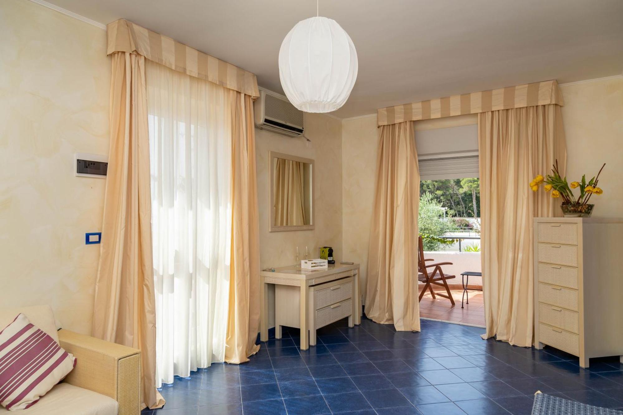 Ah Premium Baia Dei Faraglioni Hotel Mattinata Bagian luar foto